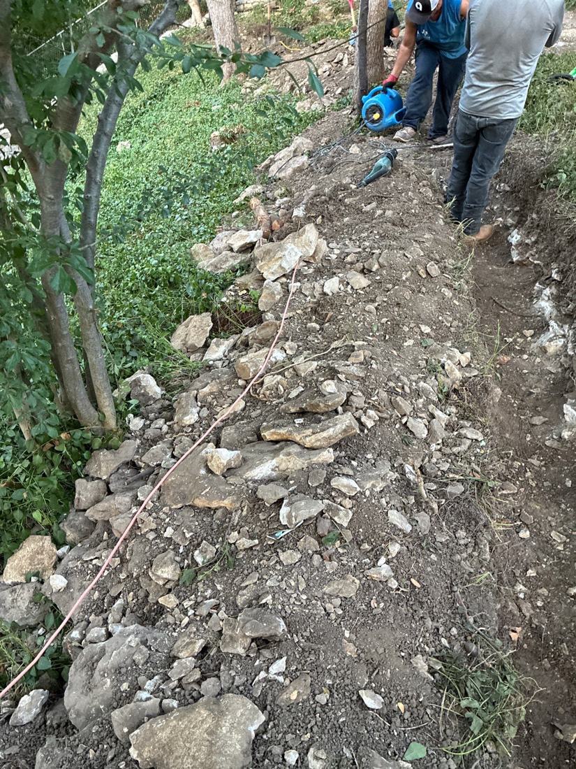 Trench full of rock on a job site